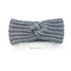 a gray knitted headband with a bow