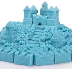 a blue sand castle with stairs and steps in the middle, on a white background