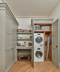 a washer and dryer in a small room