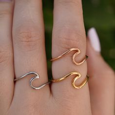 Add a touch of coastal charm to your jewelry collection with our Beach Jewelry Wave Ring. Available in stainless steel silver, gold, and rose gold, this dainty wave ring is perfect for capturing the essence of the ocean. Its minimalist design makes it a versatile accessory for surfers, ocean lovers, and anyone who appreciates nautical elegance. 💖 **Beach Jewelry Wave Ring Embrace the beauty of the ocean with this delicate wave ring. The elegant wave design is subtle yet striking, making it a perfect accessory for beach lovers and surfers alike. 🌟 **Stainless Steel Silver, Gold & Rose Gold Choose from three stunning finishes--stainless steel silver, gold, and rose gold--to match your personal style. Each option offers durability and a beautiful shine, ensuring your wave ring remains a che Beautiful Symbols, Wave Ring, Coastal Charm, How To Make Rings, Summer Glow, Ring Minimalist, Wave Design, Beach Accessories, Cute Rings