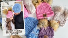 several knitted beanies are laying next to each other on a white surface with a photo of the couple