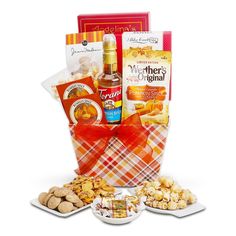 a gift basket filled with snacks and condiments for someone's special occasion