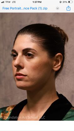 an image of a woman that is looking to the side with her head tilted back