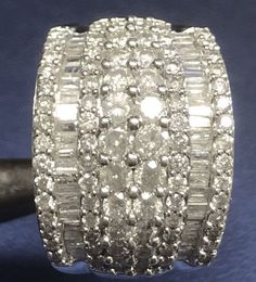 an image of a ring with diamonds on it