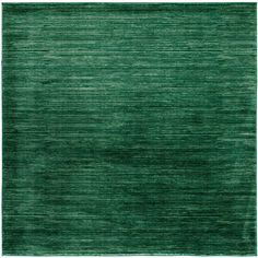 a green rug with horizontal stripes on the top and bottom, it is very soft