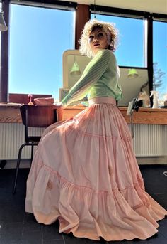 Size M The skirt is made out of used vintage taffeta silk from the 1950s. The silk has a few sign of use. Please see photo. Waist 79 cm - 31,1 inches  Length 100 cm - 39,37 inches  By request waist can be adjusted shop@bywaltz.dk Petti skin is sold separately  Follow us on Instagram @by_waltz https://www.instagram.com/by_waltz/ Maxi Pink Skirt Outfit, Vintage Silk Long Skirt, Vintage Ruffled Skirt For Party, Vintage Party Petticoat With Ruffled Skirt, Vintage Tiered Skirt For Party, Spring Fitted Taffeta Skirt, Vintage Voluminous Full Skirt Petticoat, Pink Silk Full Skirt, Vintage Full Voluminous Petticoat