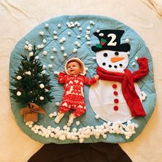 a child's birthday cake made to look like a snowman and a christmas tree