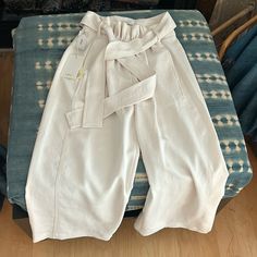 Nwt Never Been Worn Wilfred Paper Bag Waist Pants From Aritzia. Very Small Stain On The Front, Could Probably Be Removed With A Little Work. Paper Bag Pants, Paper Bag Waist Pants, Wilfred Pants, Bag Pants, Jumpsuit Trousers, Waist Pants, White Paper, Cream White, Pant Jumpsuit