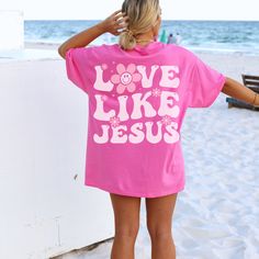 Get ready to fall in LOVE with your new Love Like Jesus aesthetic beachy t-shirt. The shirt features a back print design and a retro flower in the front pocket area.  It's the cutest and most comfortable way to wear the latest styles. * PRODUCT DETAILS * ✺ 100% Cotton ✺ Medium weight fabric  �✺ Wash and dry normally (on cool for best results) ✺ Designed and printed in the USA ✺ Due to different monitor screens, colors may vary ✺ * SIZING * ✺ FOR AN OVERSIZED FIT, SELECT TWO OR THREE SIZES UP FROM Cute Oversized Shirts, Back Print Design, Preppy Shirts, Aesthetic Beachy, Oversized Aesthetic, Preppy Shirt, Love Like Jesus, Coconut Girl, Aesthetic Shirts