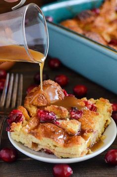 someone is pouring syrup on some cranberry bread