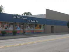 an empty street in front of a store