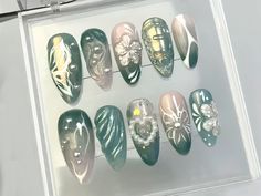 Dive into a world of vibrant energy and youthful exuberance with our Lush Green Press On Nails! 🌿💅 Transform your nails into a canvas of botanical bliss with our meticulously handcrafted floral patterns. From bold blossoms to delicate blooms, each nail is a work of art that captures the essence of nature's beauty. 🌸🎨 The lush green color palette infuses your style with freshness and vitality, creating a harmonious blend of colors that is both captivating and invigorating. 🌈💚 Adorned with heart-shaped pearl charms, these nails add a touch of romance and sophistication, creating a perfect balance between dynamic energy and elegant charm. 💖✨ Embrace the youthful vibe and trendy nature chic that our Green Leaf Press On Nails offer. Perfect for those who appreciate a look that is both mo Fake Nails Green, Green Press On Nails, Press On, Gothic Nails, Nails Green, Nails Today, Green Colour Palette