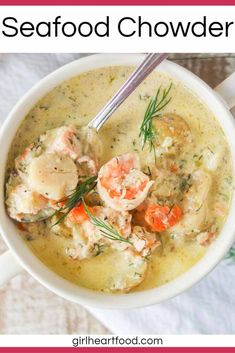 a white bowl filled with seafood chowder and garnished with fresh dill