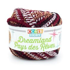 a ball of yarn that is red, white and brown with the words dreamland pays des rives on it