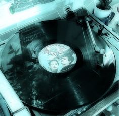 an old record player with two people on it