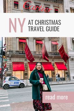 a woman standing in front of a building with the words new york at christmas travel guide