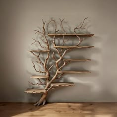 a wooden shelf with shelves made out of branches