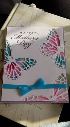 a close up of a greeting card with butterflies