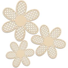 three wooden cut outs with flowers on them