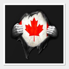 the canadian flag is being held by two hands in front of a torn paper background