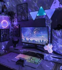 a computer desk topped with two monitors and a keyboard in front of a purple background