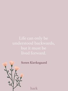 a pink background with an image of flowers and the words life can only be understand backwardss, but it must be lived forward