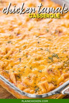 a casserole dish with chicken and cheese in it on a wooden table top