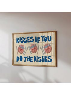 a sign that says kisses if you do the dishes hanging on a wall in a room