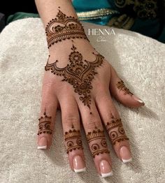 henna tattoo on the hand of a woman