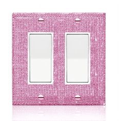 a pink light switch cover with two lights on each side and one in the middle