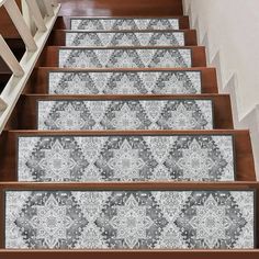 the stairs are decorated with decorative tiles