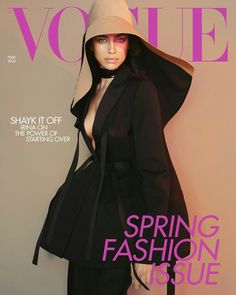 a magazine cover with a woman wearing a hat