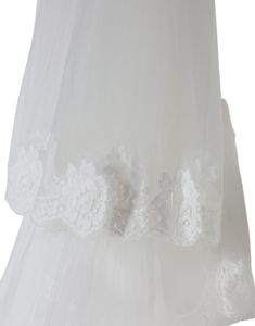 the back of a wedding dress with white lace