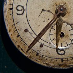 an old clock face showing the time