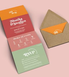 an envelope and business card on a pink background