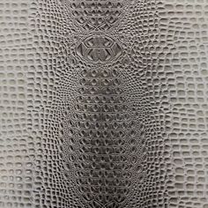 an image of a textured surface that looks like it is made out of crocodile skin