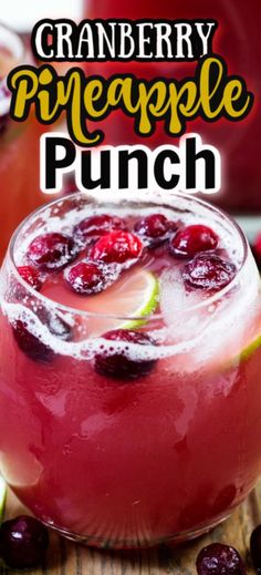 cranberry pineapple punch in a glass garnished with cherries