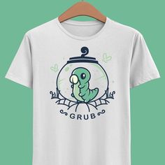 Design inspired in Grub - Grubs in glass jars from Hollow Knight video game. Hi there! I'm Alundrart, a professional t-shirt designer which are doing t-shirt designs since 2012. If you see my designs in any other shop on Etsy, take into account that it's an art theft. These shops take the low resolution images from the internet, this means they use my designs with poor quality and can't print the designs in a great quality. Please, avoid these shops like that and support original artist. Print o The Knight Hollow Knight, Gaming Tees, Indie Game, The Knight, Game Video, Gaming Shirt, Hornet, Glass Jar, Glass Jars