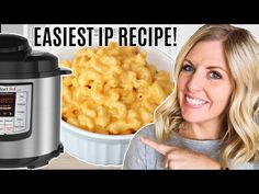 a woman pointing to an instant pot with macaroni and cheese in front of her