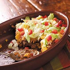 a casserole dish with meat and vegetables in it is ready to be eaten