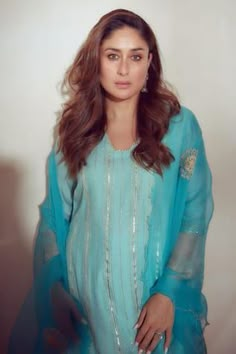 Turquoise blue chanderi kurta with zari and sequins detailing and sleeves are highlighted with sequins and embroidered organza details. Paired with shantoon palazzo with zari lace details and embroidered scallop organza dupatta.
Component: 3
Pattern: Embroidered
Type Of Work: Zari Work
Neckline: Blunt V Neck
Sleeve Type: Long Sleeves
Fabric: Zari Chanderi, shantoon and organza
Color: Blue
Other Details: 
Zari work
Cutwork dupatta
Occasion: Puja - Aza Fashions Kurta Palazzo Set, Kurta Set For Women, A Line Kurta, Palazzo Set, Organza Dupatta, Kurta With Pants, Purple Silk, Alia Bhatt, Fashion App