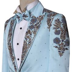 Looking for the perfect tuxedo for your wedding or gala event? Look no further than this baby blue luxury designer tuxedo suit.This stunning tuxedo is made with premium quality fabric and adorned with multi-blue and golden shade handwork. The unique design handwork embellishment on the peak lapel, shoulders, and sleeves is sure to turn heads. White pearls add a touch of sophistication, while the perfectly designed same fabric tuxedo tie with hand embellished work is an outstanding addition.Pair Tuxedo Tie, Designer Tuxedo, Wedding Tuxedo, Gala Event, Blue Luxury, Purple Prom, White Tuxedo, 2 Piece Suit, Gala Events