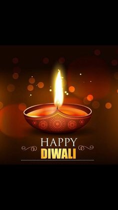 a happy diwali greeting card with a lit candle in the shape of a bowl