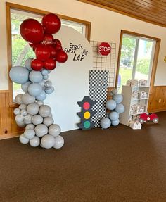 balloons are arranged in the shape of letters and numbers on display at a children's birthday party