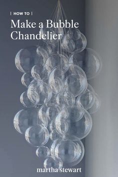 a chandelier hanging from the ceiling with bubbles on it