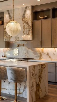 a kitchen with marble counter tops and bar stools