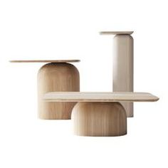 three wooden stools with one sitting on top of the other, all in different shapes and sizes