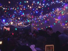 a room filled with lots of colorful lights