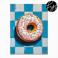 a doughnut covered in sprinkles sitting on top of a blue and white checkered tablecloth