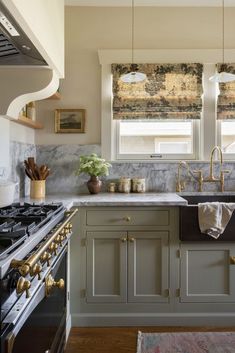 a kitchen with marble counter tops and an oven